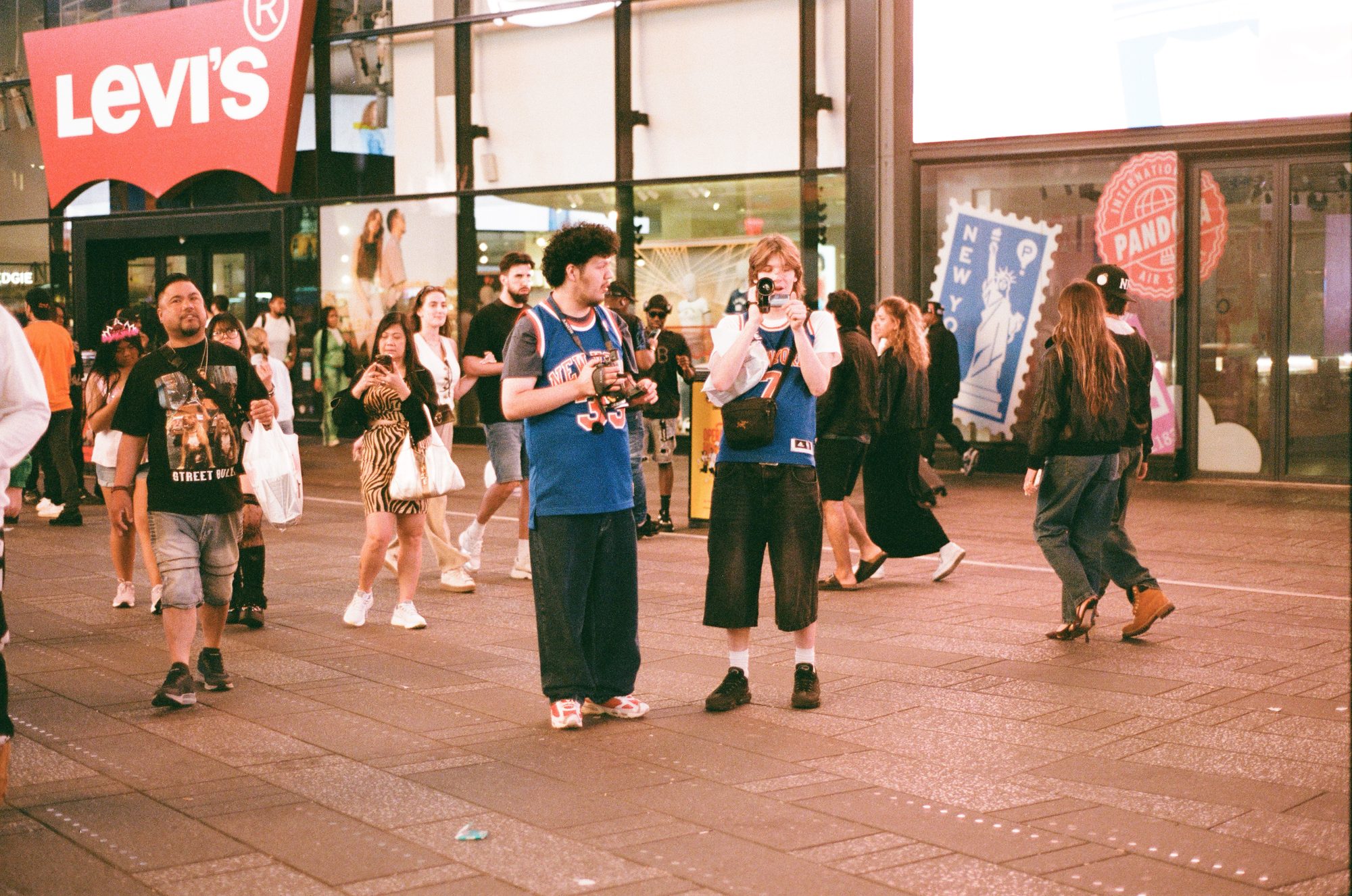 Fans in jerseys milling outside the Levi's store in Times Square