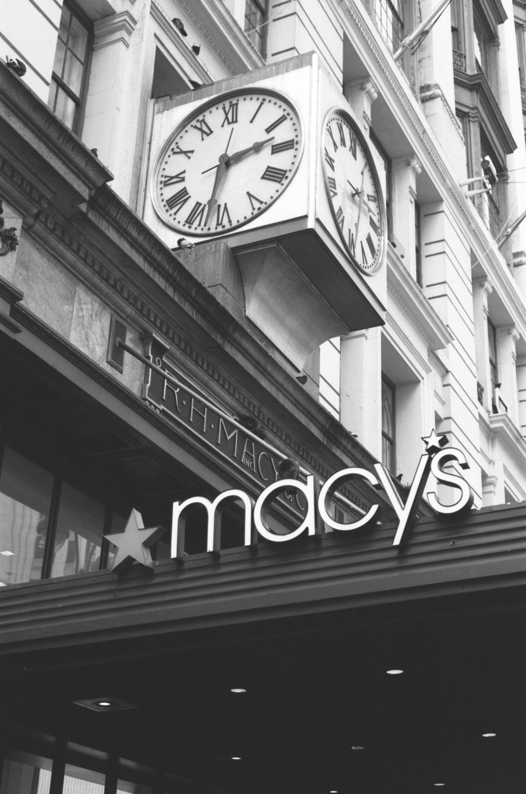 The Macy's clock and sign seen from below