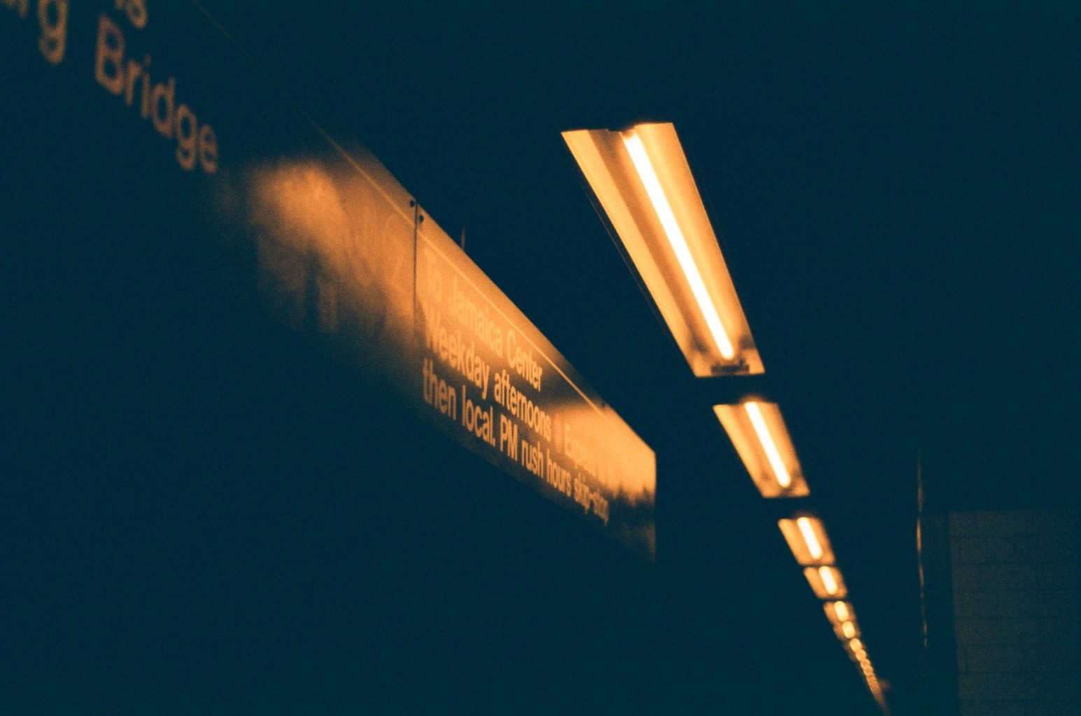 The streaked lights of a passing train in the dark